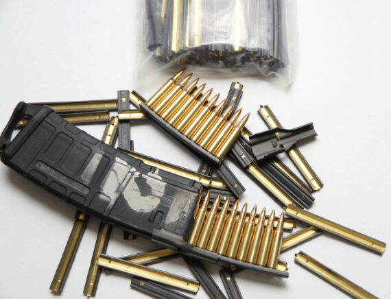 stripper clips and a lone magazine